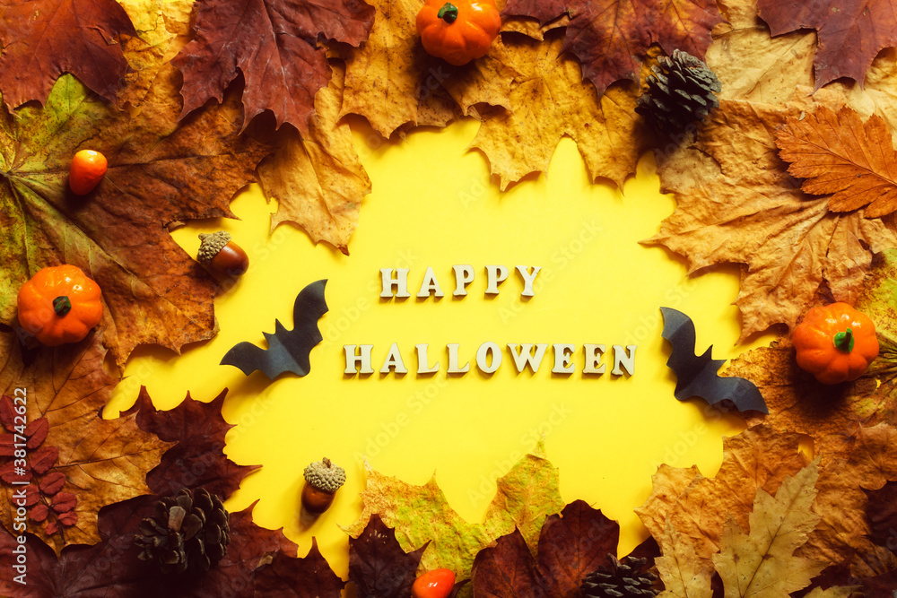 Colorful leaves frame on yellow background with copy space. Halloween card. Colorful leaves frame on yellow background with copy space. Halloween card.