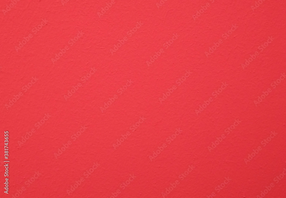 The red painted plaster of the walls has a rough concrete surface. For the image background texture The red painted plaster of the walls has a rough concrete surface. For the image background texture