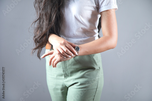 woman showing the hand watch