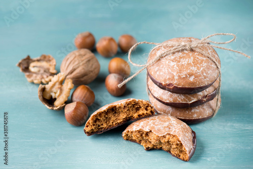 Nuremberg gingerbread with nuts on a blue and grey background, empty space for test, traditional german sweetness for christmas kown as Lebkuchen photo