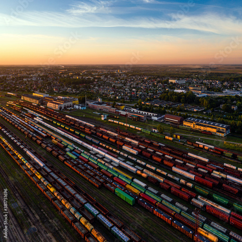 Aerial view of the railway junction with freight trains at sunset, Radviliskis, Lithuania