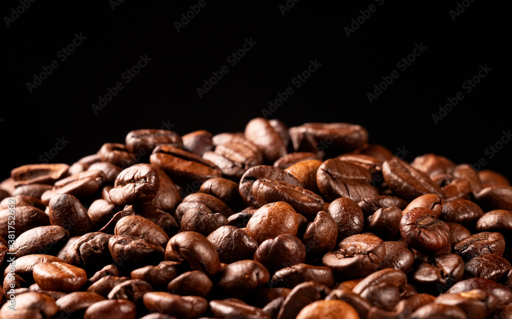 Close-up view of freshly roasted coffee beans. Close-up view of freshly roasted coffee beans.