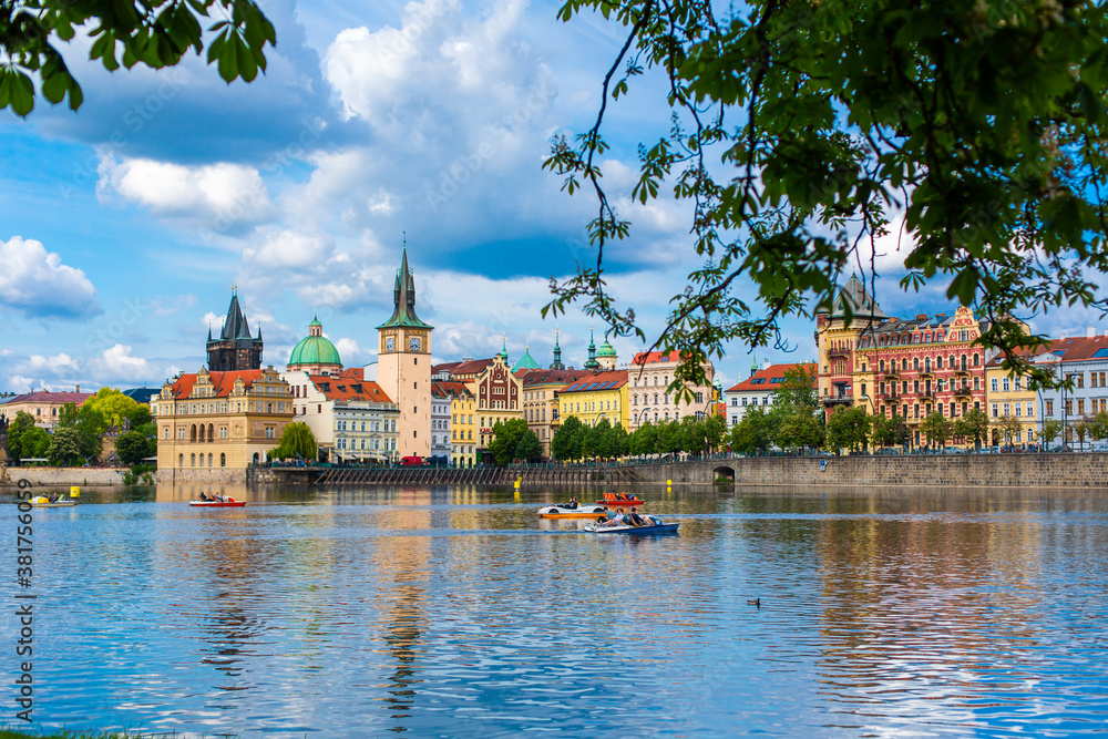 Obraz premium The landscape of the city of Prague view from the Vltava river on the ancient architecture of the city