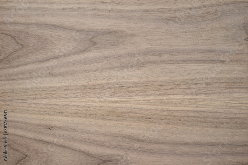 Horizontal wood texture of walnut board, background.