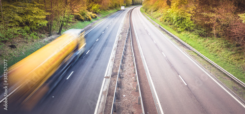 Speeding blurred truck on a dual motorway in Scotland - speeding drivers of lorries are dangerous