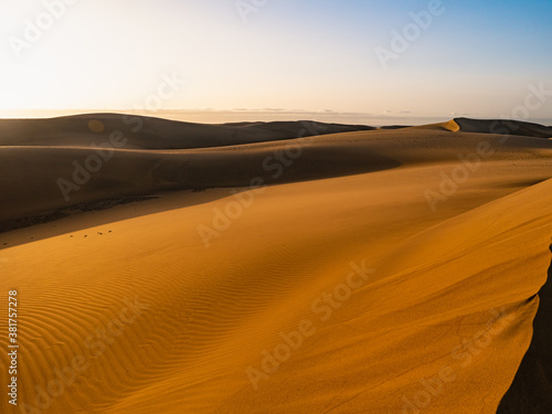 dunes of maspalomas at sunrise