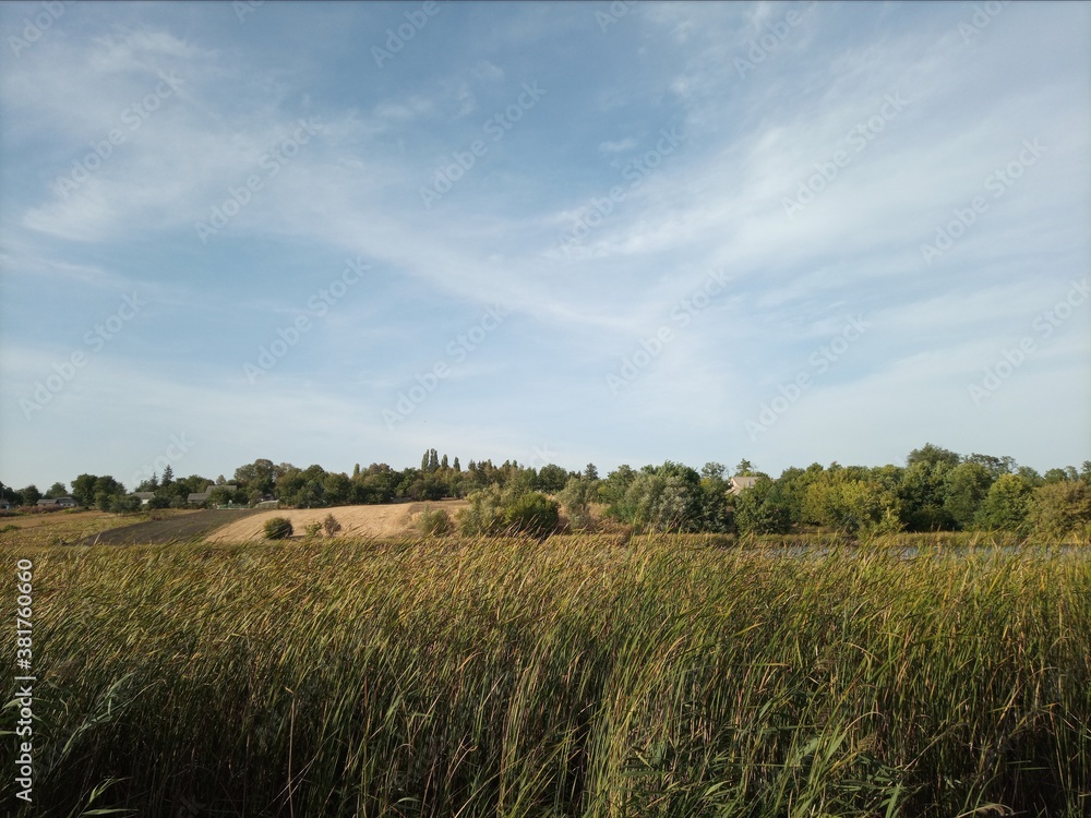 A beautiful autumn rural landscape. A sunny day. Landscape in the countryside A beautiful autumn rural landscape. A sunny day. Landscape in the countryside