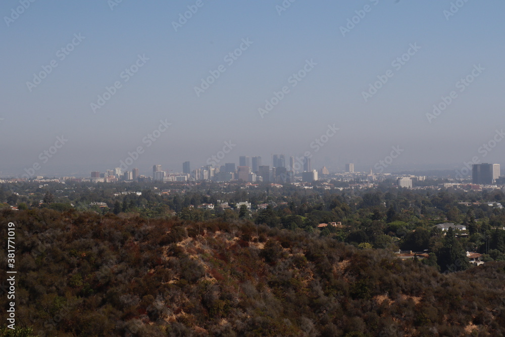 city skyline blanketed in hazy smog