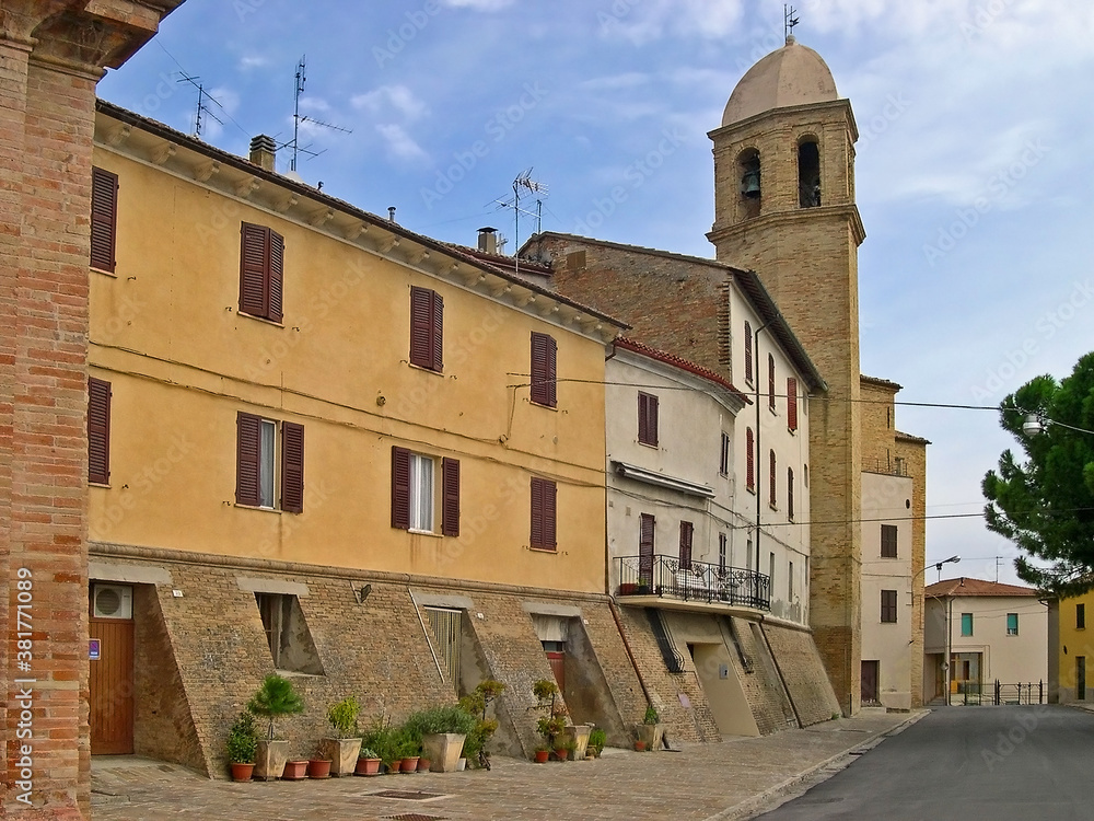 Italy, Marche, San Marcello old medieval buildings and San Marcello church Bell tower.