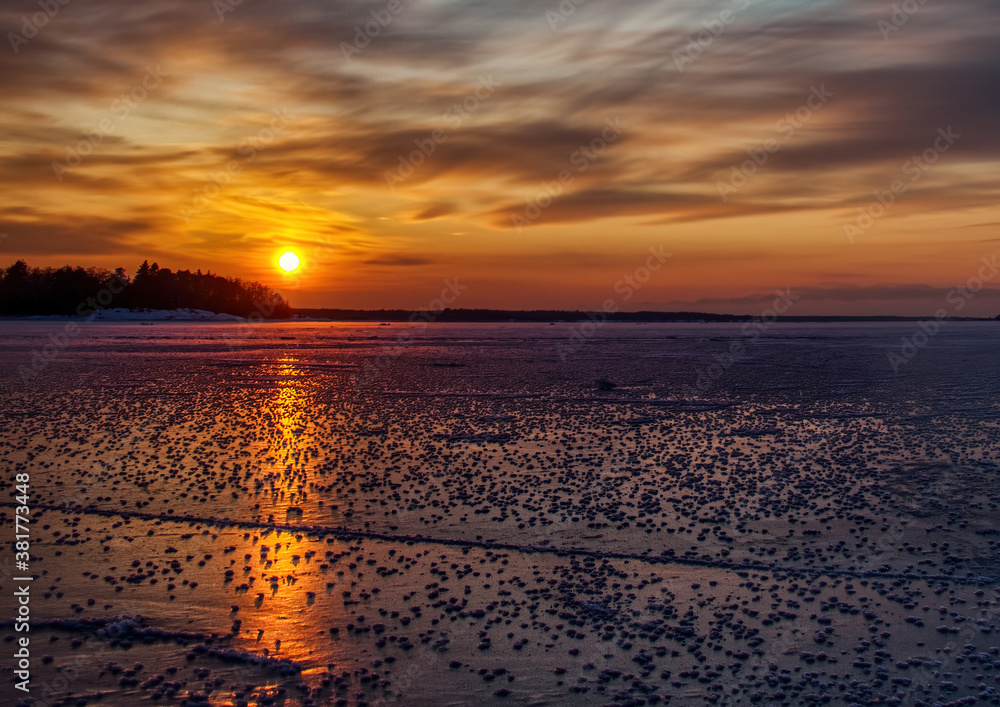 Pictures of a sunset on the frozen Baltic Sea near the Finnish town of Rauma Pictures of a sunset on the frozen Baltic Sea near the Finnish town of Rauma