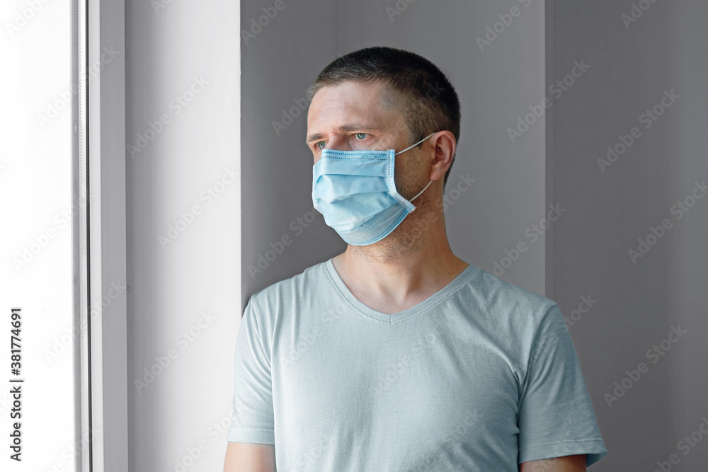 Man in protective medical mask against viruses and infections