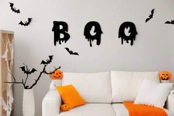 Stylish room interior with creative Halloween decor