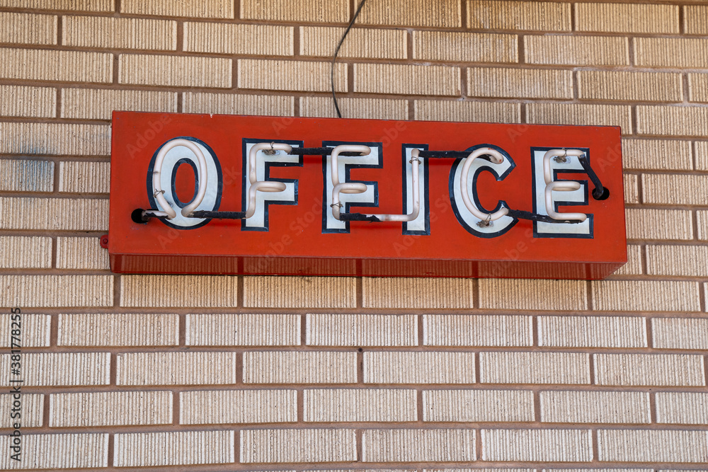 Old rustic neon sign for a motel office, taken at an abandoned, seedy motel Old rustic neon sign for a motel office, taken at an abandoned, seedy motel