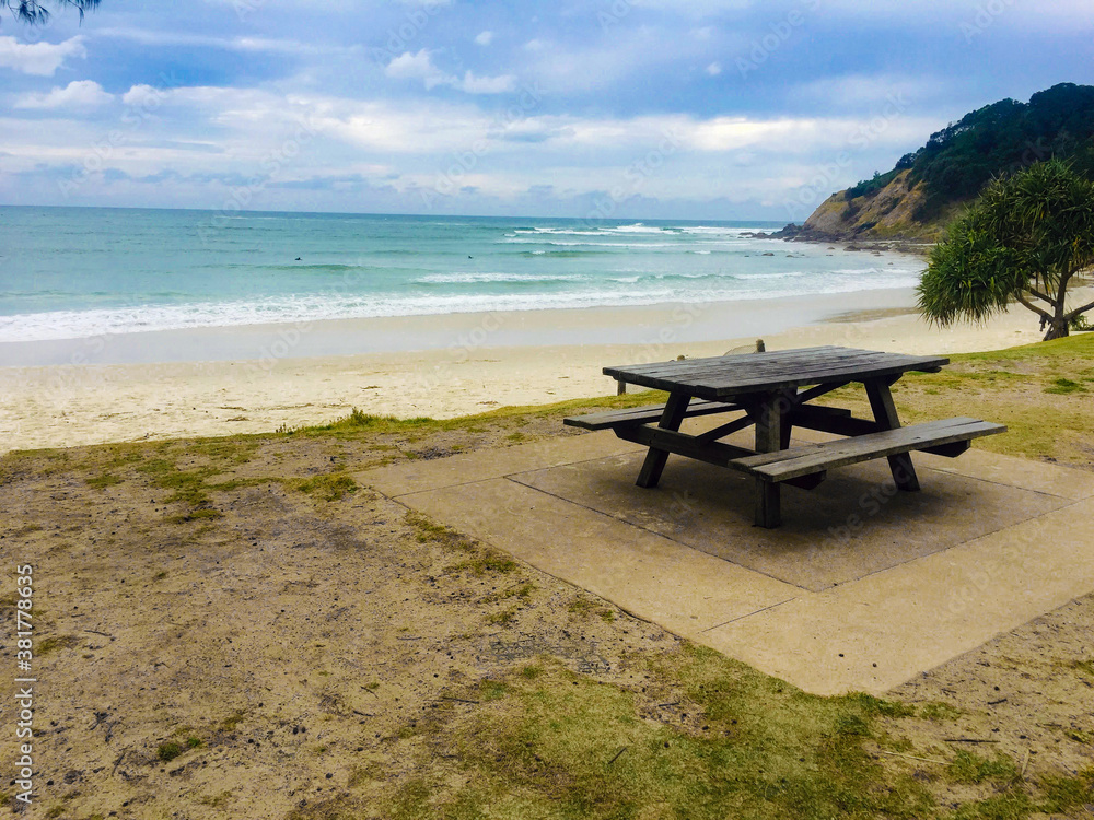 beach with wooden bench