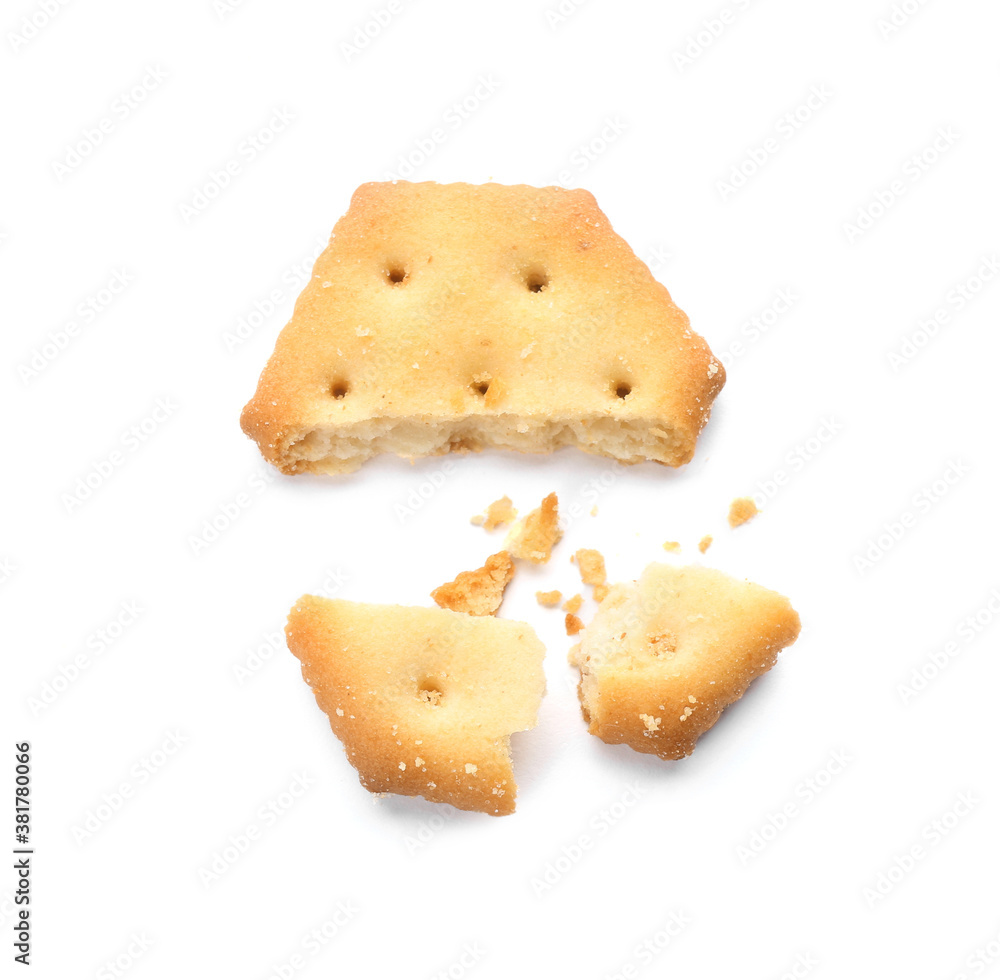 Broken delicious crispy cracker isolated on white, top view Broken delicious crispy cracker isolated on white, top view