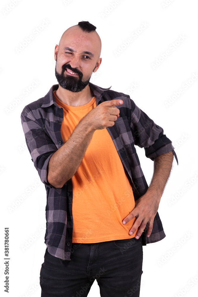 Positive young man winking and encouraging someone Positive young man winking and encouraging someone