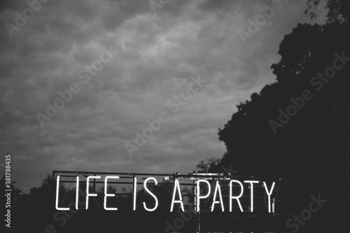 neon sign that says: Life is a party.