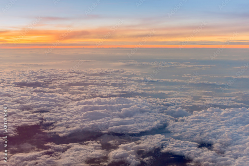 Amazing fluffy clouds moving softly on the sky and the sun shining through the clouds with beautiful rays. Sunset ,Sunrise with many white clouds many shapes. Amazing fluffy clouds moving softly on the sky and the sun shining through the clouds with beautiful rays. Sunset ,Sunrise with many white clouds many shapes.