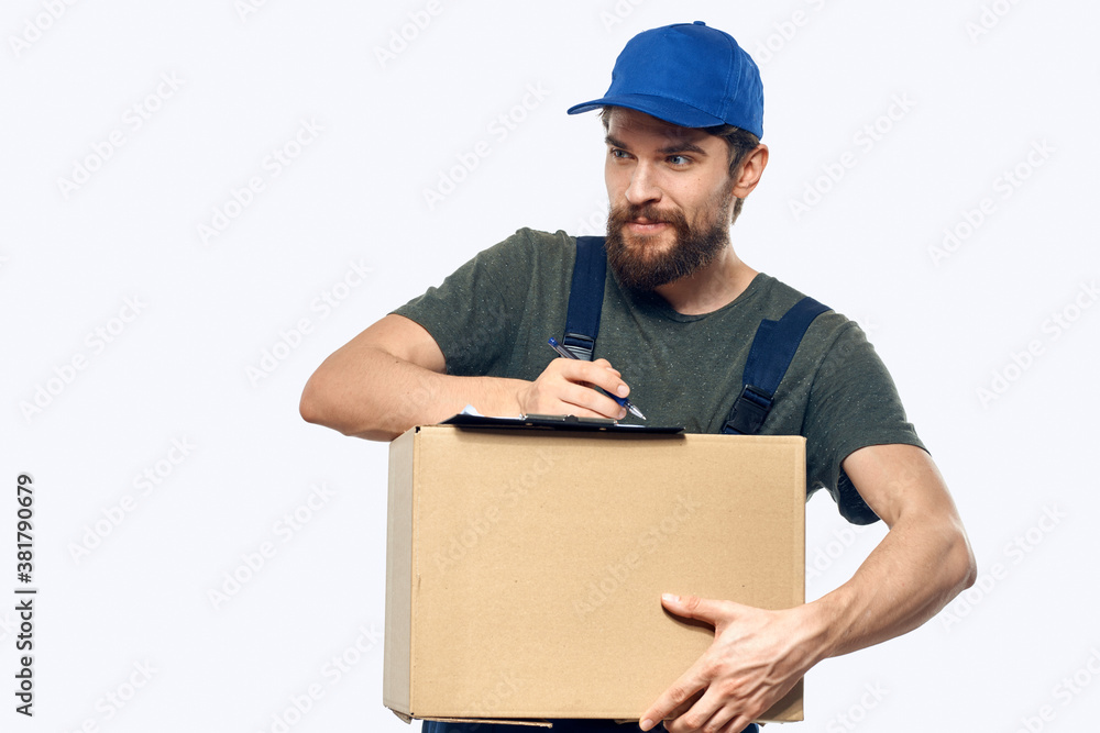 Working male courier with box in hand documents delivery service light background Working male courier with box in hand documents delivery service light background
