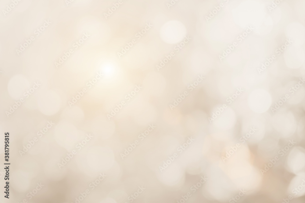 Cream blurred christmas lights background. Design effect focus happy holiday party glow texture white wallpaper bokeh sun sunny star shiny soft plain warm flare blur night light new year.