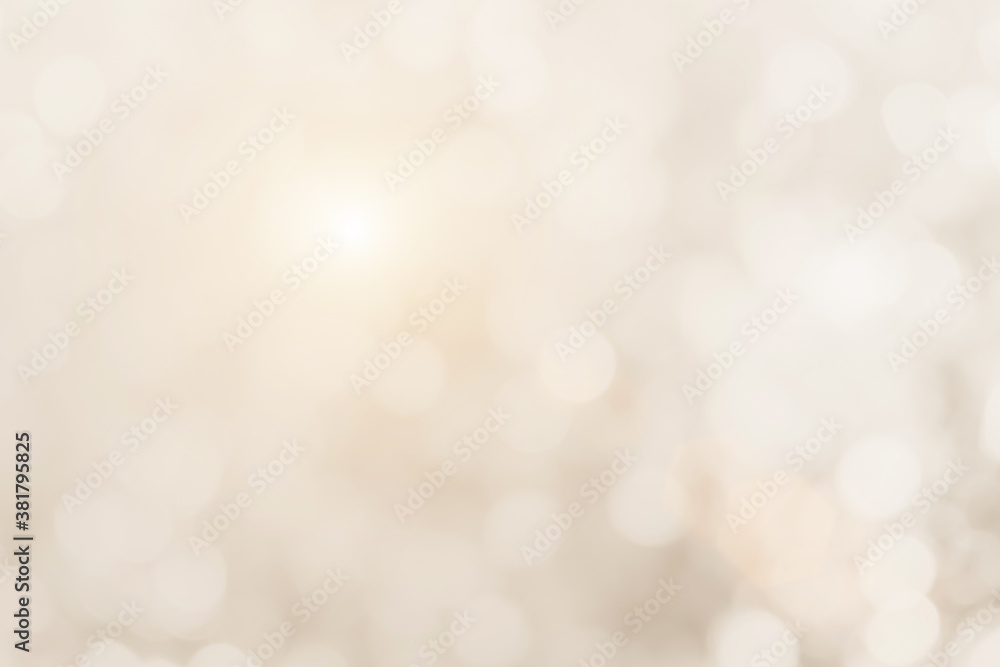 Obraz premium Cream blurred christmas lights background. Design effect focus happy holiday party glow texture white wallpaper bokeh sun sunny star shiny soft plain warm flare blur night light new year.