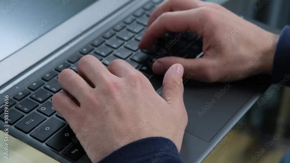 young man working at laptop in office, concept of business idea, workplace, trading young man working at laptop in office, concept of business idea, workplace, trading