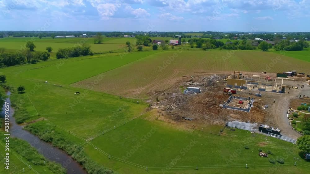Aerial View of an Amish Barn Raising after a large fire destroyed them on a beautiful summer day
Aerial View of an Amish Barn Raising after a large fire destroyed them on a beautiful summer day