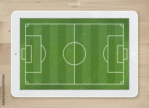 Soccer football field background in display of tablet screen for create soccer game and soccer tactic idea. Vector.
