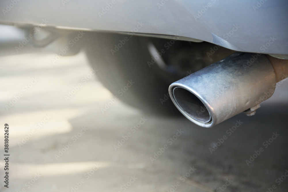 Stainless Steel Straight Exhaust Pipe from a car, Concept for vehicle's exhaust system repair or tubing check to prevent harmful fumes contain poisonous chemicals like carbon monoxide.