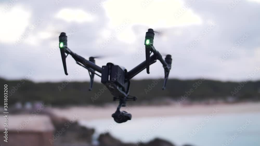 Slow Motion footage of flying quadcopter - DJI Inspire 2 - Professional film production equipment - Flyying away