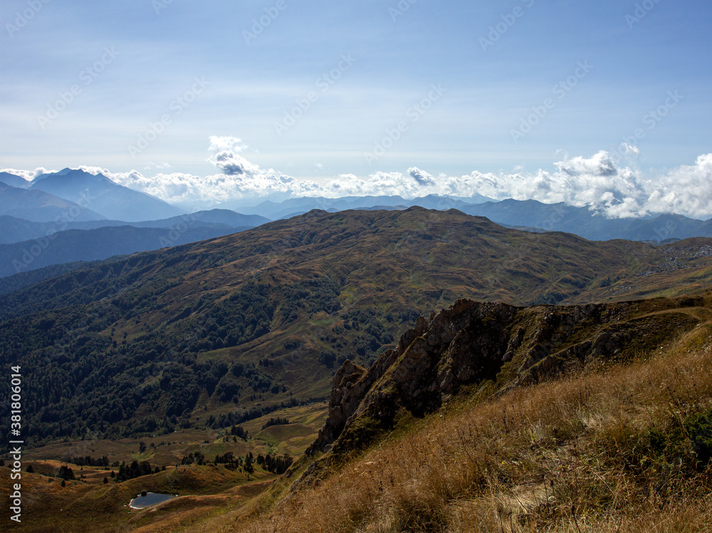 Panorama of mountains in autumn ,a place of rest and travel in the bosom of nature in the mountainous area of subalpine meadows.