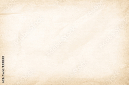 Brown recycled paper crumpled texture background. Cream Old vintage page or grunge vignette parchment old blank newspaper. Pattern empty rough cardboard creased grunge surface backdrop with space.