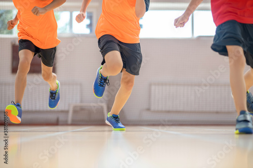 Close up picture of running kids in sportswear