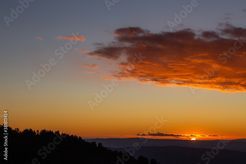 Sunset over mountains and valley © Massimo