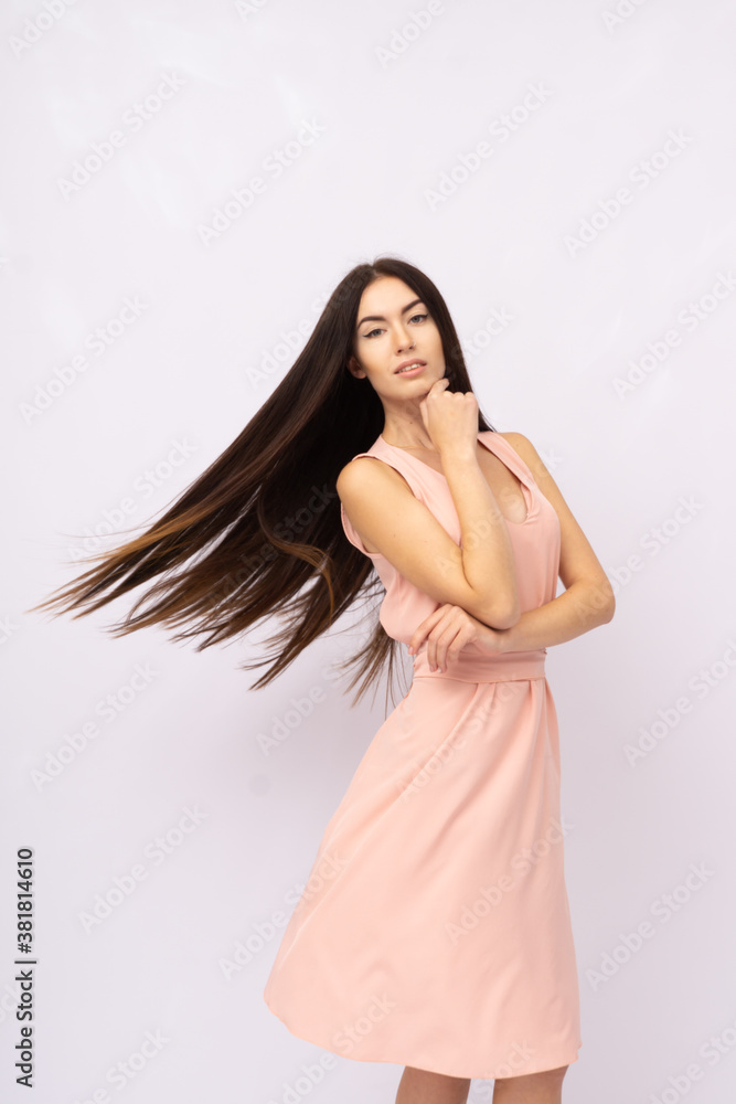 Fototapeta premium Young woman with long hair. Brunette