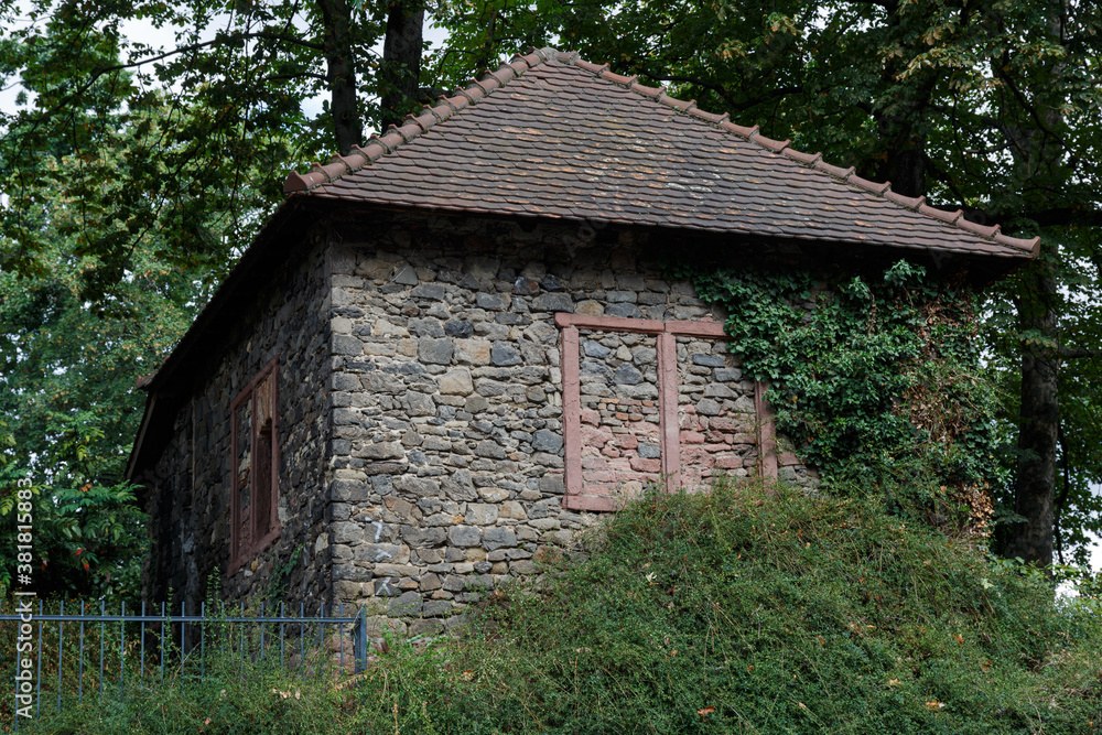 Old stone house in a park Old stone house in a park