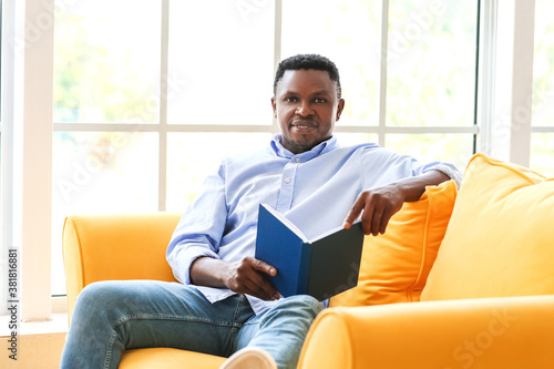 African american man readin...