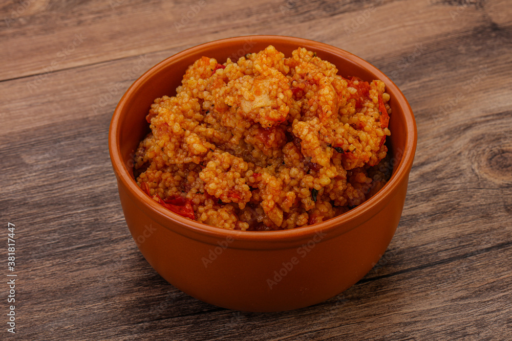 Couscos with tomato and chicken Couscos with tomato and chicken