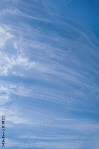 thin white clouds on a blue sky background during summer in Marbella