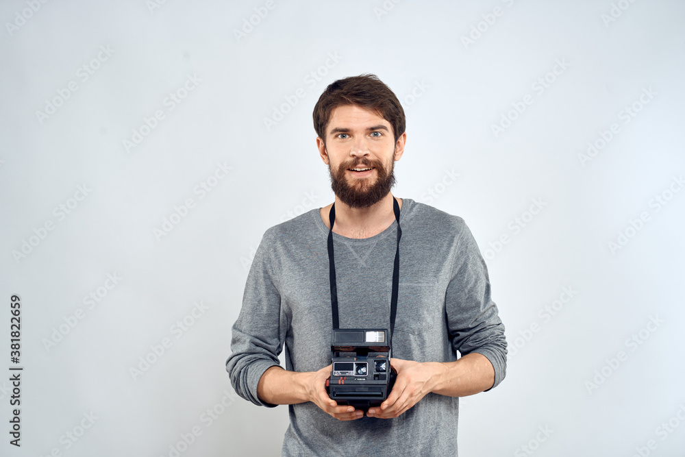 Male photographer professional camera work Studio Technology modern art light background Male photographer professional camera work Studio Technology modern art light background