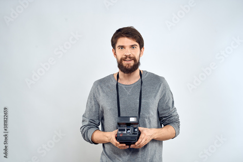 Male photographer professional camera work Studio Technology modern art light background