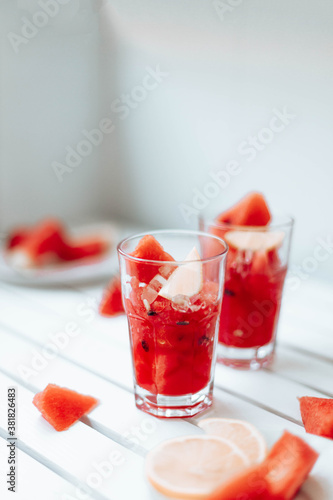 Wallpaper Mural Fresh summer watermelon drink in glass jar and piece watermelon on wooden board Torontodigital.ca
