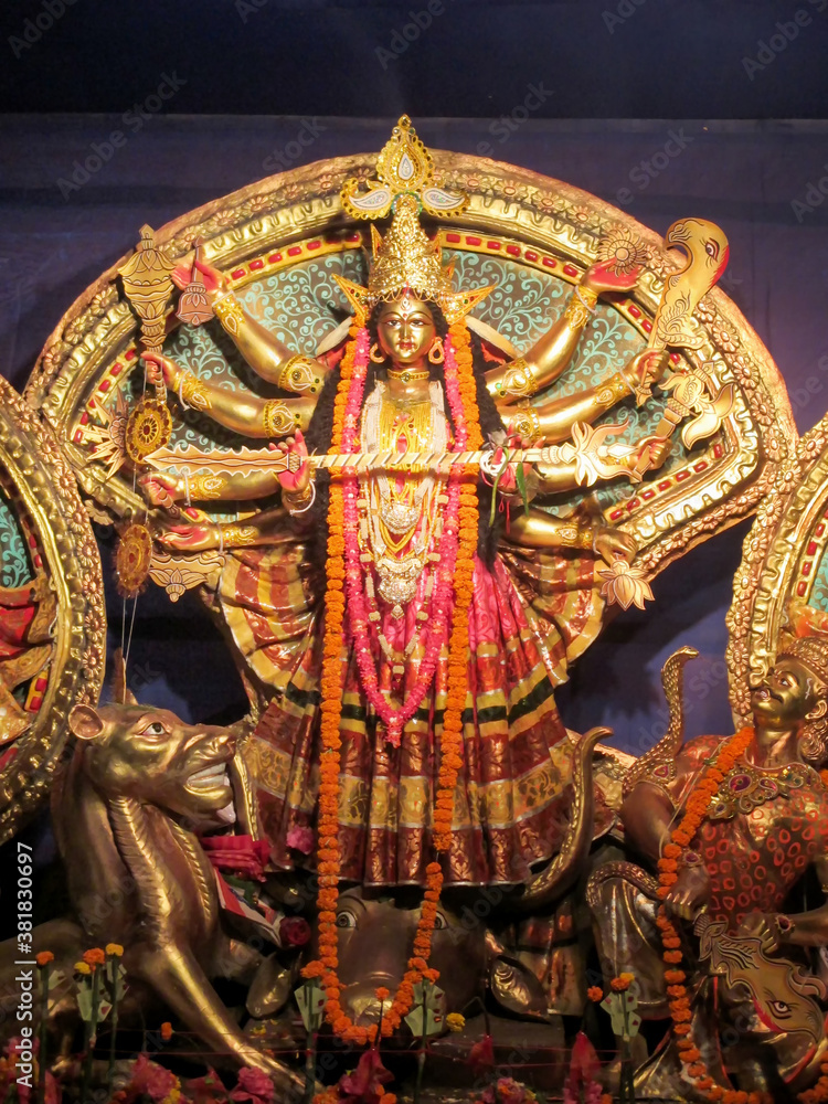 Close up view of Maa Durga's Face during Durga Puja festival. Durga Puja or Durgotsava, is an annual Hindu festival celebrated mainly in West Bengal, India.