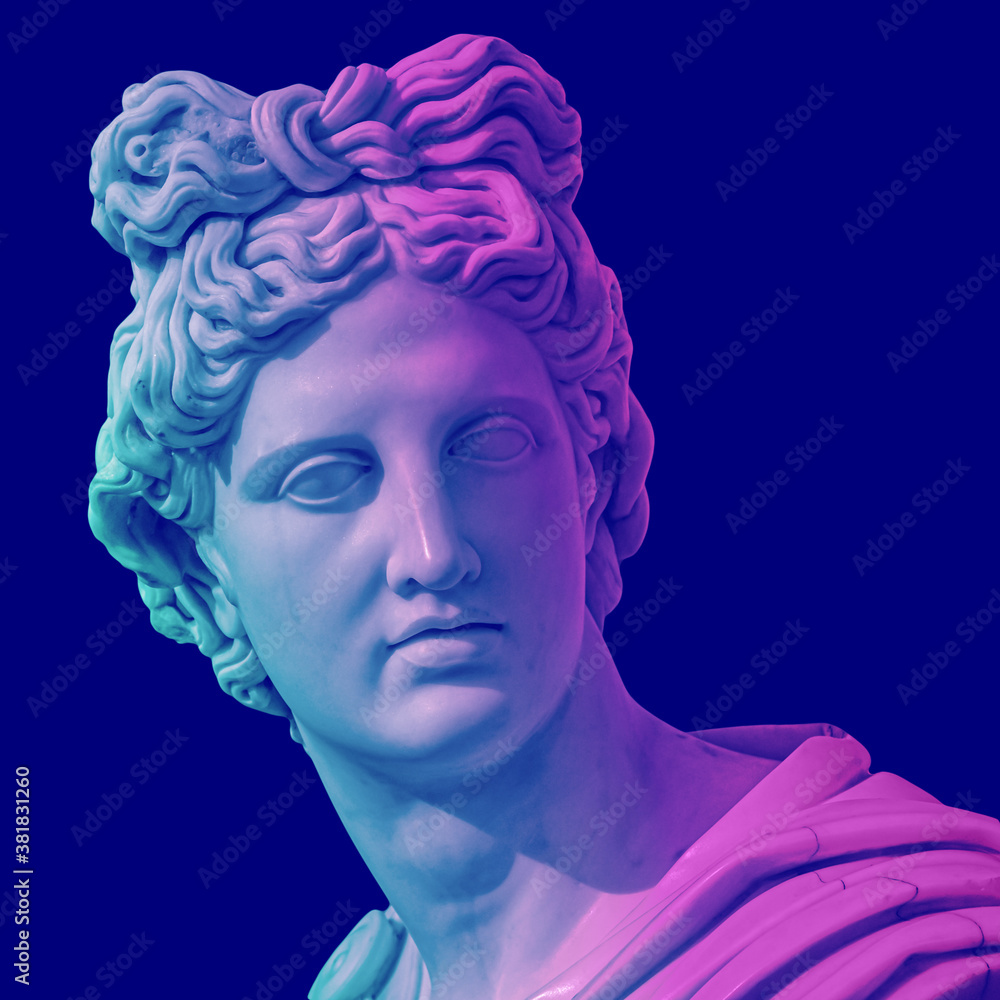 Statue of of Apollo God of Sun. Creative concept colorful neon image with ancient greek sculpture Apollo Belvedere head. Webpunk, vaporwave and surreal art style