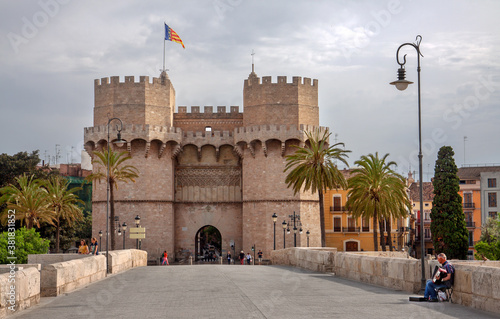 Valencia, Spain: Serranos towers and gate with Valenciana flag on top. 