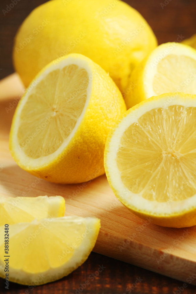 Lemons lying on the wooden rustic table Lemons lying on the wooden rustic table