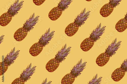 Pineapple pattern on yellow background 
