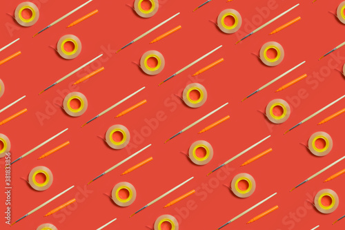 Duct tape, brush and marker. Stationery set pattern on red background. Back to school concept 