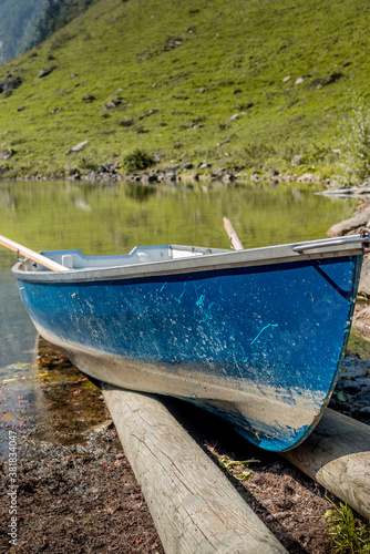 An old rowing boat on the shores of the Seealpsee lake in Appenzell  Switzerland