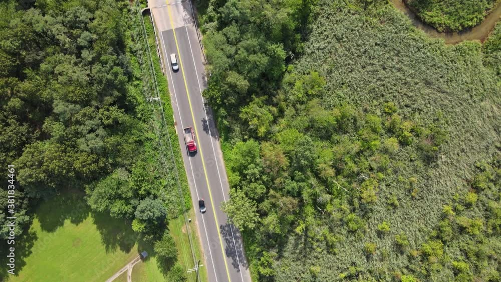 Aerial view of highway with of park landscape complex in the recreation area beautiful view on green forest with trees Aerial view of highway with of park landscape complex in the recreation area beautiful view on green forest with trees